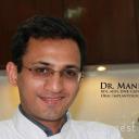 Dr. Manish Juneja: Dentist in delhi-ncr